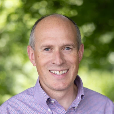 Professional outdoor headshot of Dr. Scott Lally, third-generation chiropractor at Lally Chiropractic in Yakima, Washington